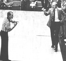 Coach Norm Stewart challenges a referee