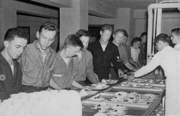 Naval students receiving their mess hall meals