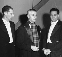 Vladimir Golschmann, conductor of the Saint Louis Symphony, is flanked by two members of his orchestra at a concert by the Symphony at MU, ca. 1948. Golschmann was awarded an honorary Doctor of Music degree by the University in 1954. The photo was taken by Robert Tonn.